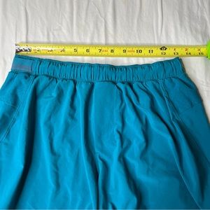 Lululemon surge shorts running teal blue men size medium 4" inseam